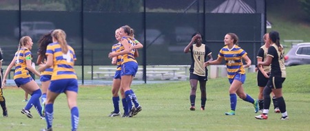Soccer opens season with win